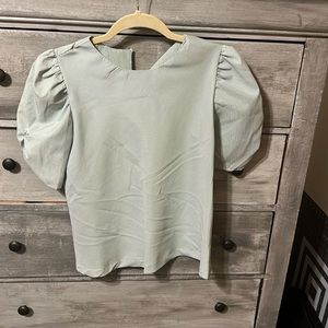 White and green striped blouse